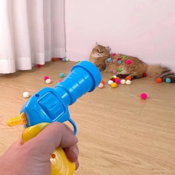 Interaktive Katzenspielzeugpistole: Ansprechender Laser-Jagd und federnder Spaß für energiegeladene Katzen |   Stimuliert Spiel und Übung - Image 2